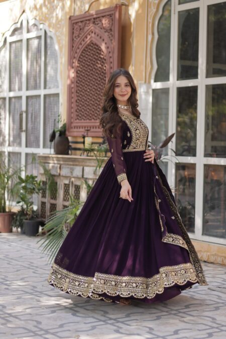 Women's Luxurious Plum Velvet Anarkali Gown with Heavy Gold Zari & Sequin Embroidery – Perfect for Weddings & Grand Festivities